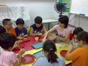 Teacher demostrating cookery skills